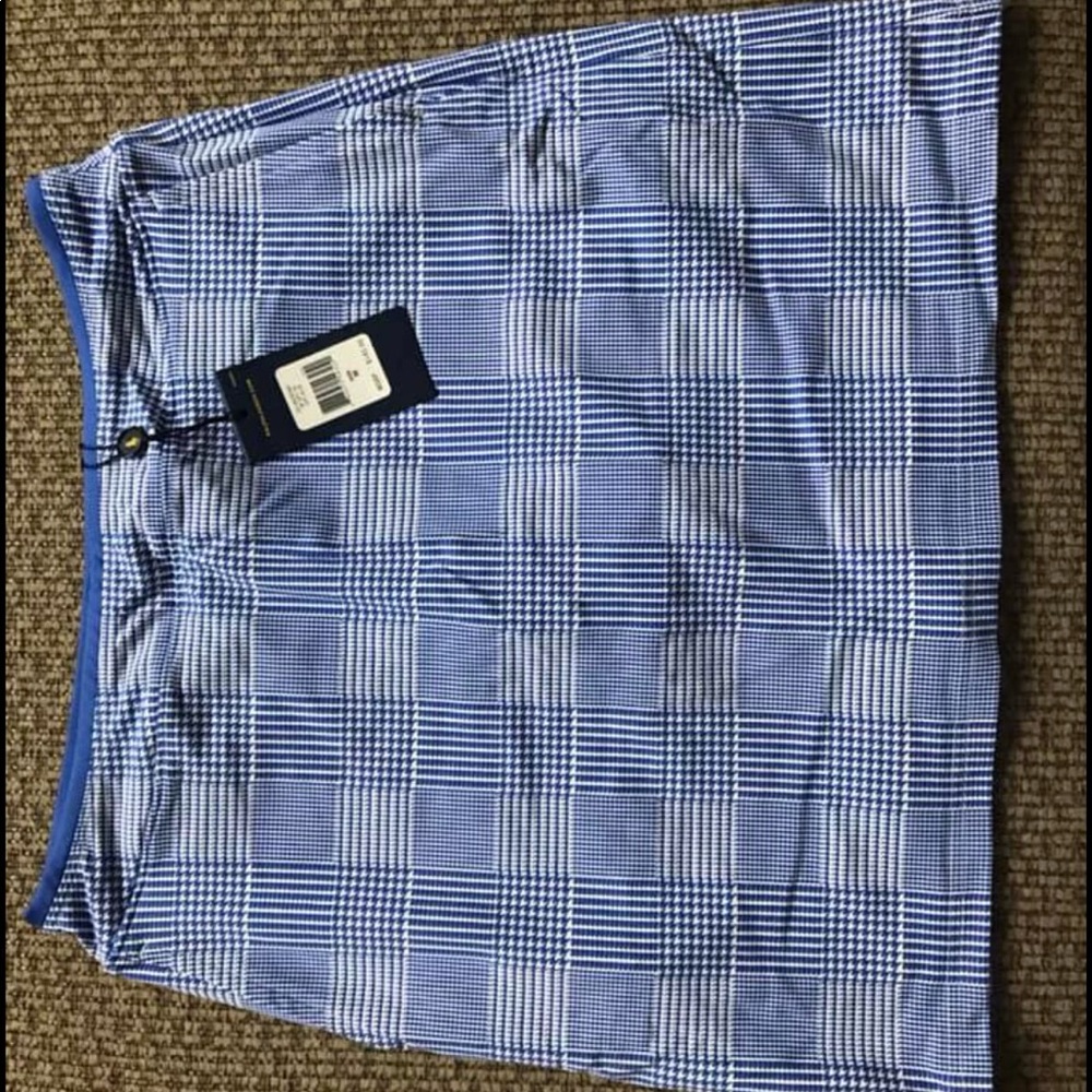 Blue and white golf skort size Medium with tags
